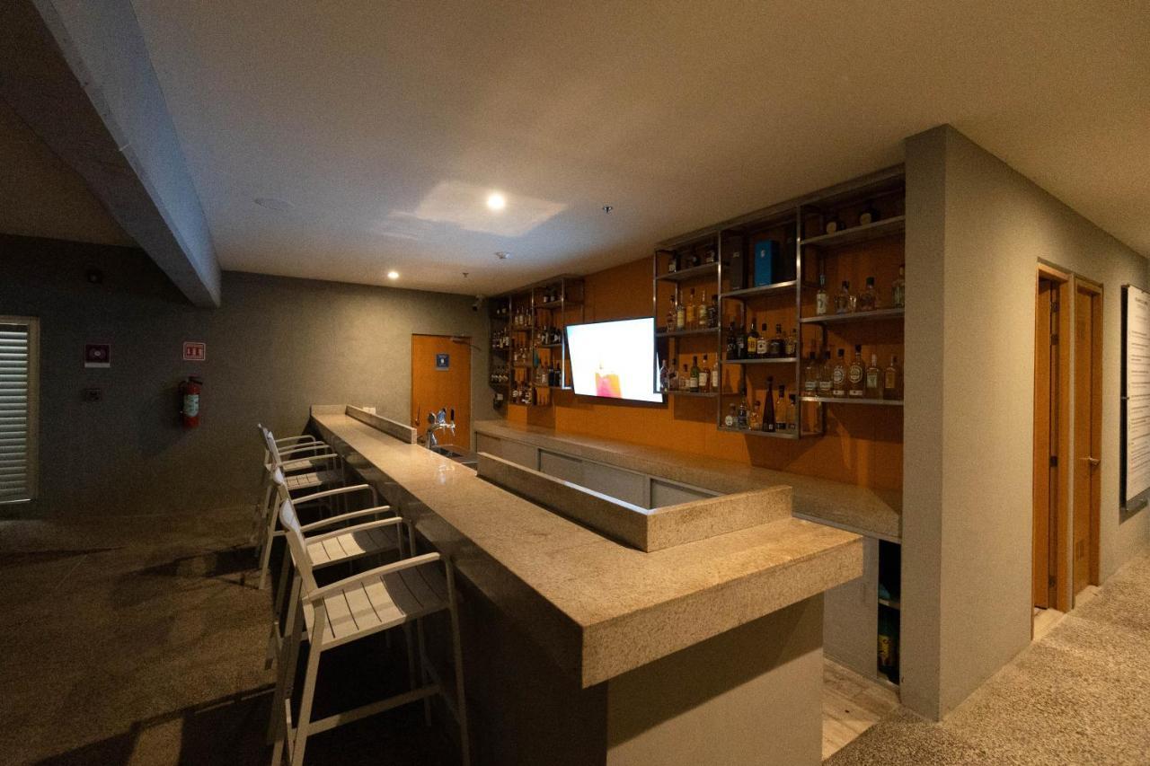 Hotel Mio Vallarta Unique & Different- Adults Only Puerto Vallarta Bagian luar foto A bar in a hotel